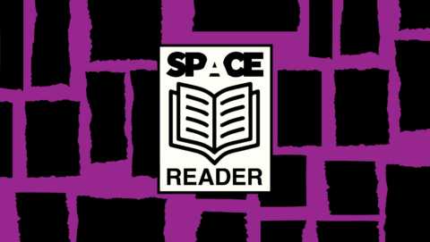 Illustration of black and purple background with 'space reader' written around an open book