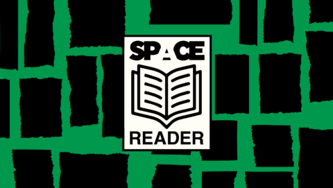 Illustration of black and green background with 'space reader' written around an open book