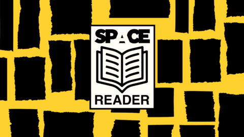 Illustration of black and yellow background with 'space reader' written around an open book