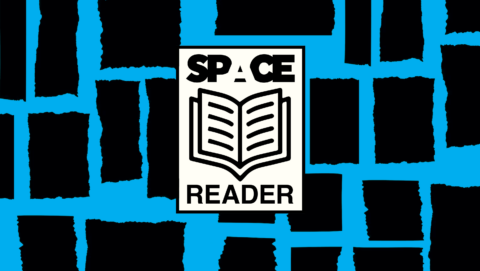 Illustration of black and blue background with 'space reader' written around an open book