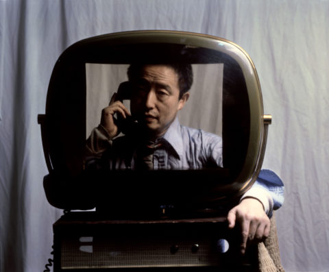 nam june paik inside of a tv screen on the telephone
