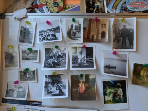 a collection of family photos posted on a wall