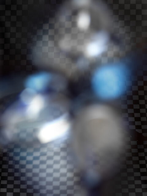 An abstracted image of a black and white checkerboard pattern with blurred lenses from a pair of glasses in the field of view, abstracting and blurring the pattern. By Tad Beck.