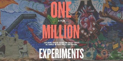 A colorful mural background and text in red and white which reads "One Million Experiments"